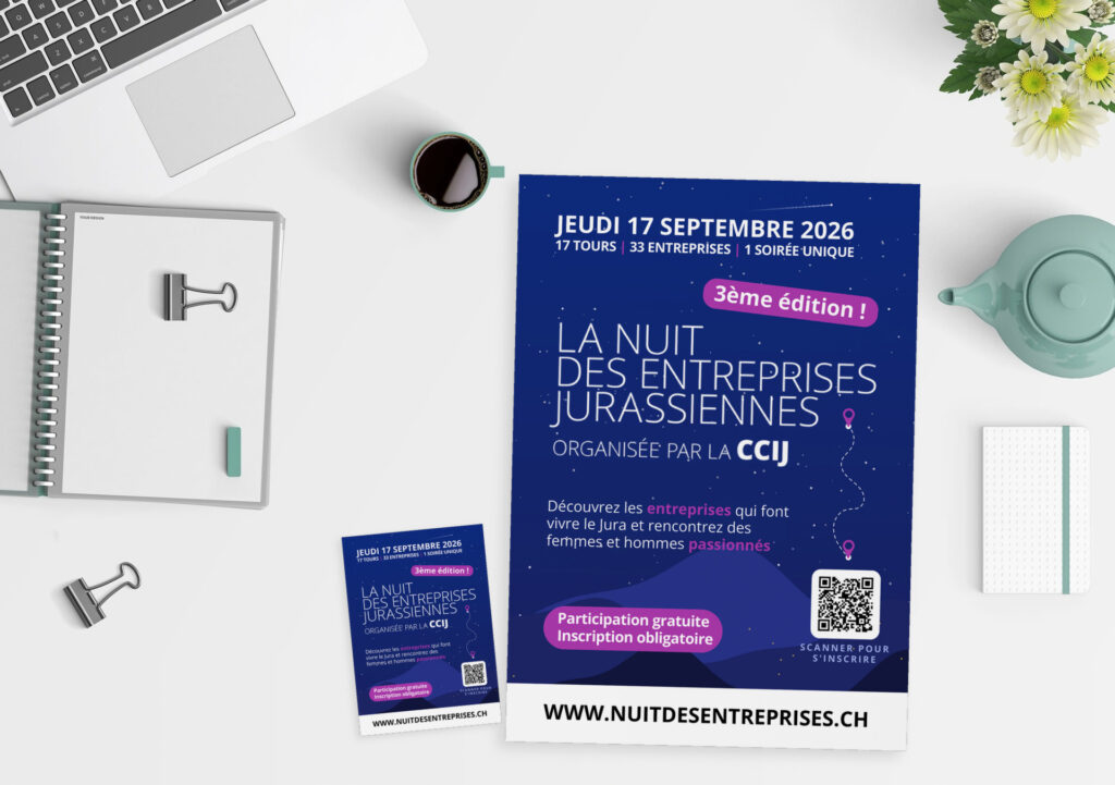 Affiche A3 et flyer A6 de La Nuit des entreprises jurassiennes posés sur un bureau blanc